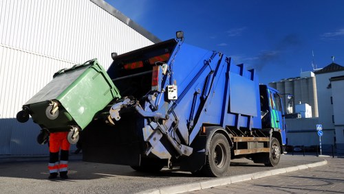 Waste collection truck operating in Brockley