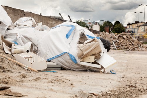 Recycling center processing furniture in Brockley